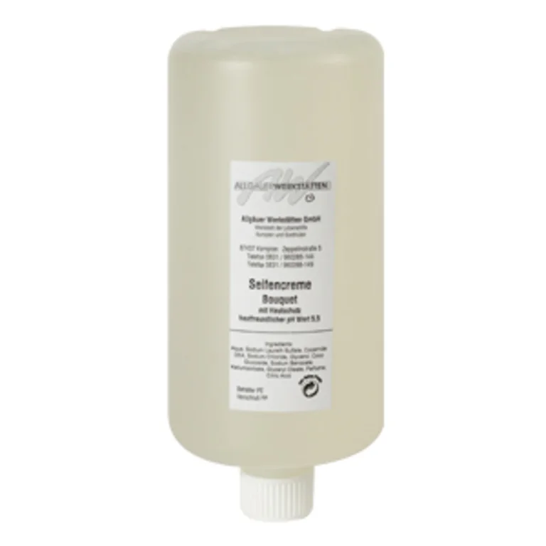 Eine transparente Flasche mit einem weißen Deckel. Auf dem Etikett steht „Seltencreme Bouquet“ sowie Inhaltsstoffe und Anwendungshinweise. Die Flasche scheint für kosmetische oder pflegende Produkte bestimmt zu sein.